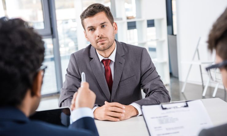 A young man is having a job interview